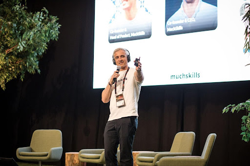 Daniel Nilsson on stage MuchSkills wins North Start pitch